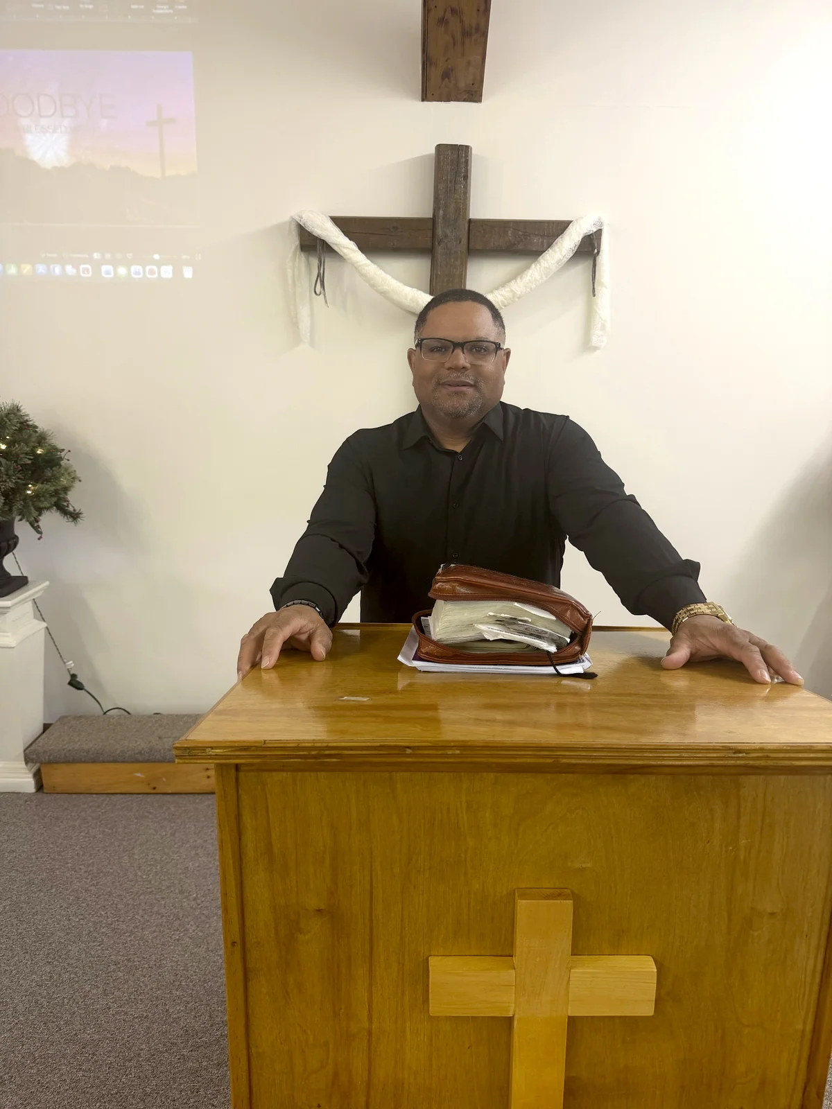 Pastor Charles Motley at Podium Conquest Christian Center Church in Durhamville, NY